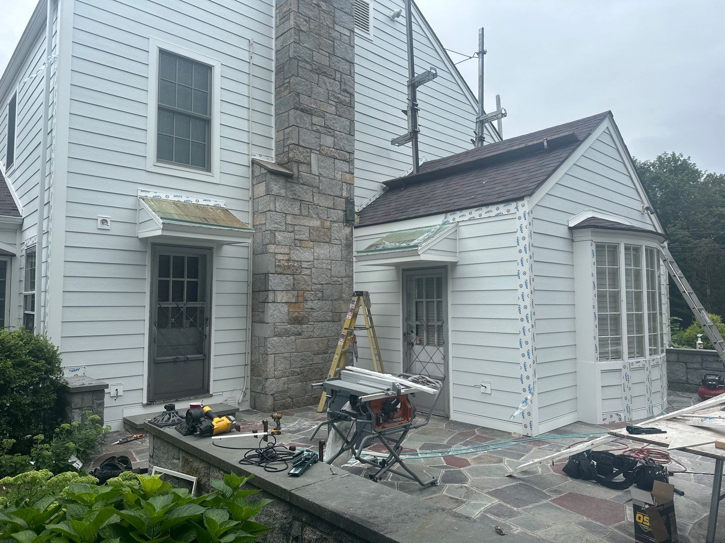 Siding Installation using Hardie Plank Artic white by A Plus Exterior