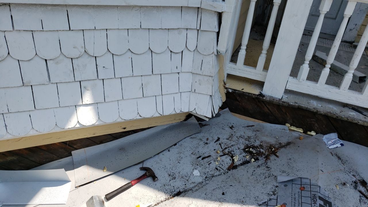 Residential Roofing Installation using Roof Replacement by American Roofing & Construction LLC