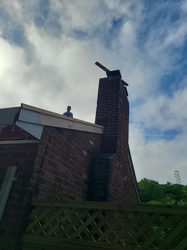 Springfield Tree Damage Restoration: CertainTeed Landmark Designer Shingles in Charcoal Black by RM Banning, Inc.