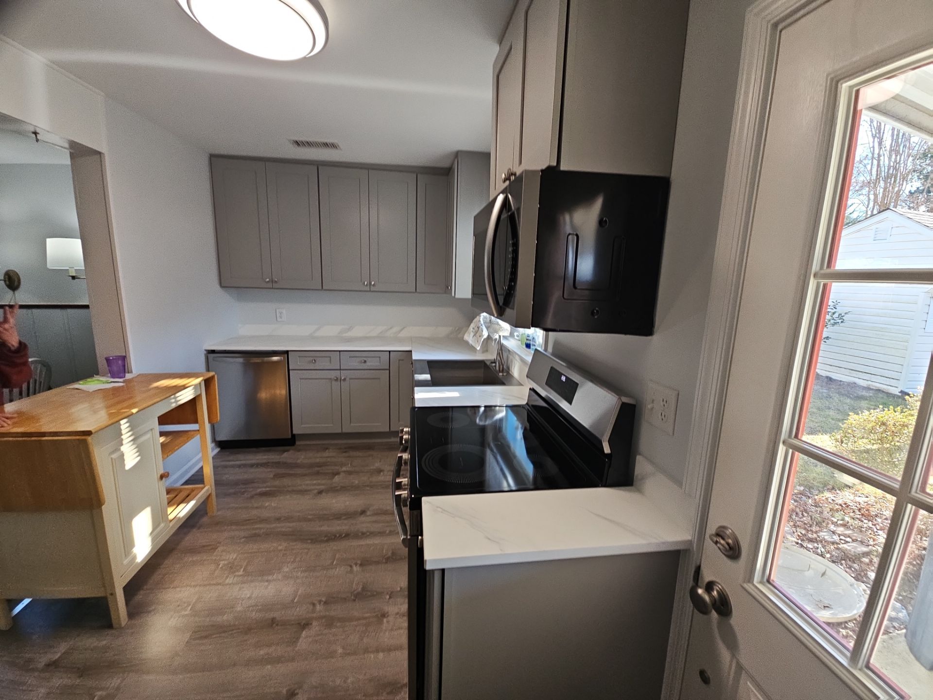 Kitchen and living area remodel by Window Depot of Annapolis