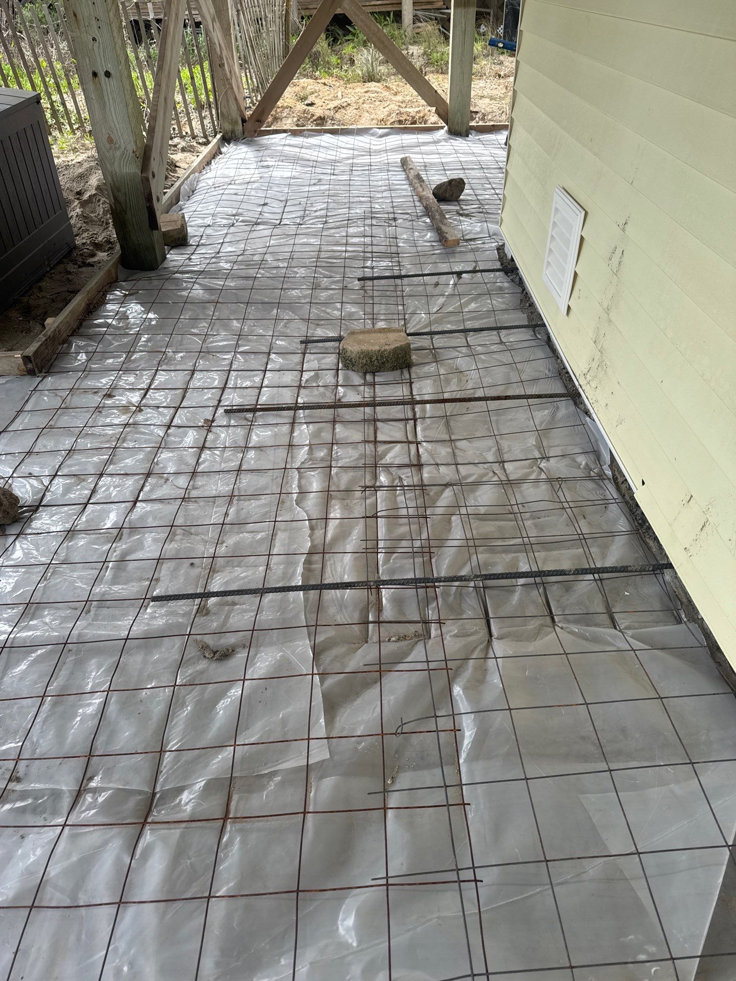 Coastal gravel ground cover for Oceanfront Property in Oak Island by RGR Construction and Roofing, LLC