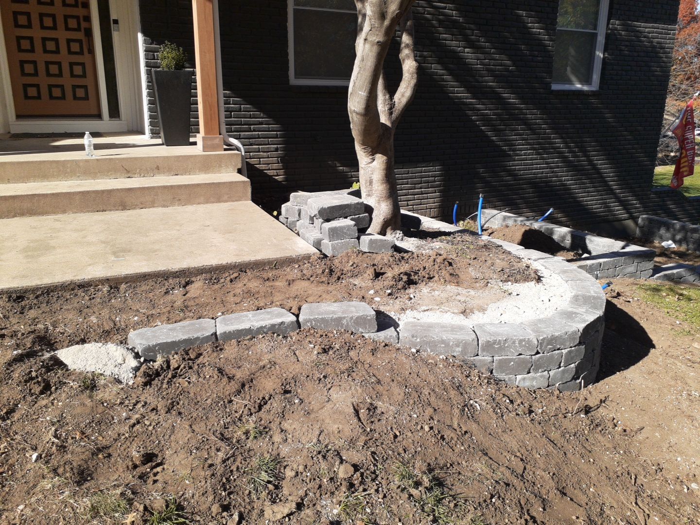 Entire Home Landscape and Retaining Walls by LAND ESCAPES LLC