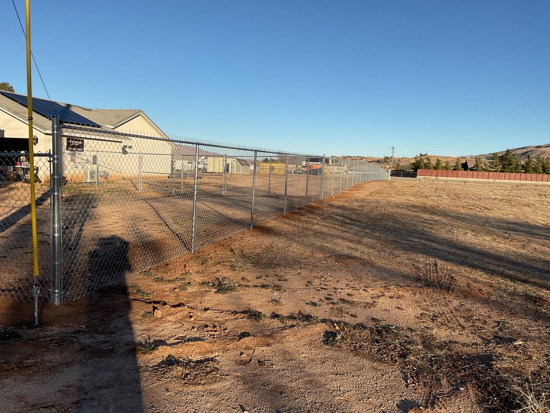 6ft and 5 ft chain link by Fence Guys Inc. 