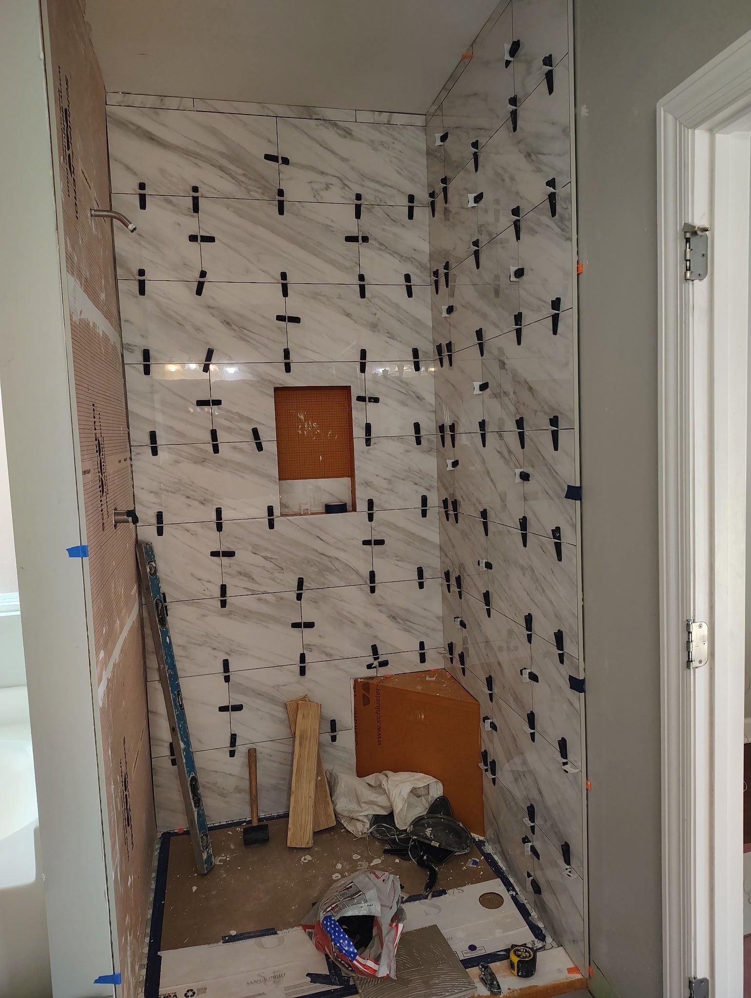 Tile shower remodel and heated floors by Footprints Floors of Nashville