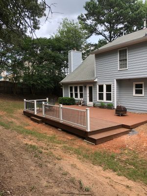 Composite Deck Replacement with White Railings in Duluth