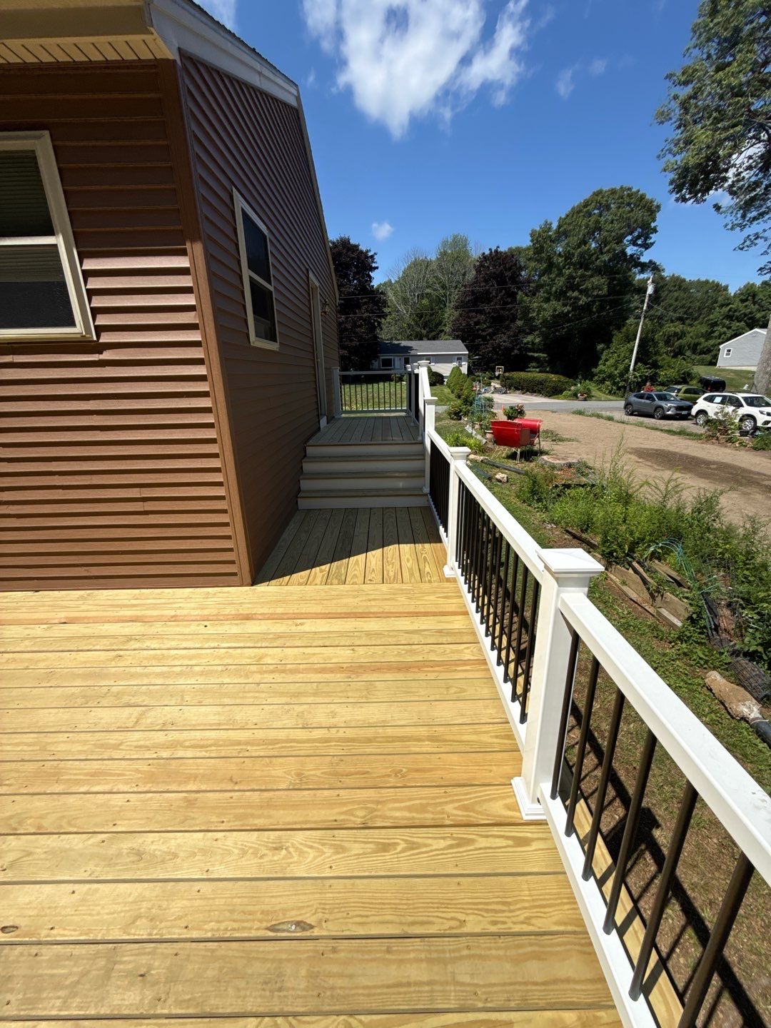 Custom Pressure-Treated Deck and Accessible Ramp Installation in York by Sensible Home Solutions