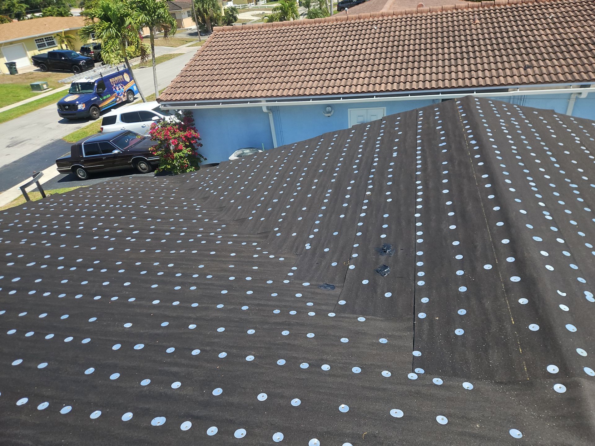 Residential Roofing Installation using 1" Nail strip metal roof by BLUES BROTHERS ROOFING
