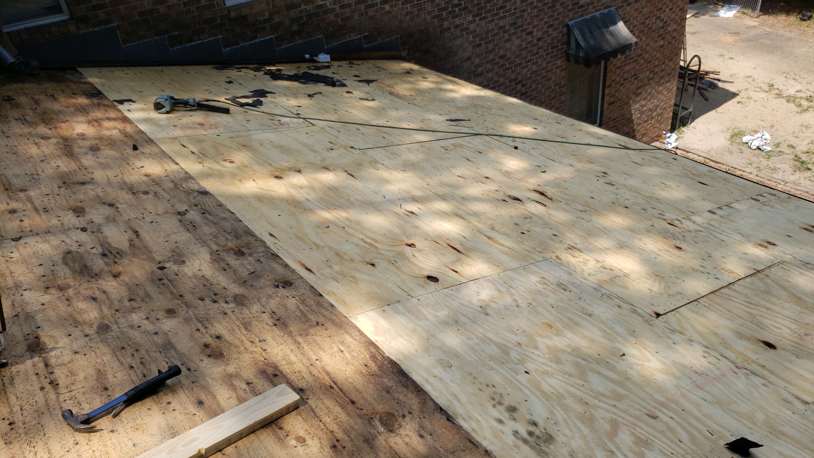 Residential Roofing Installation using Roof Replacement by American Roofing & Construction LLC