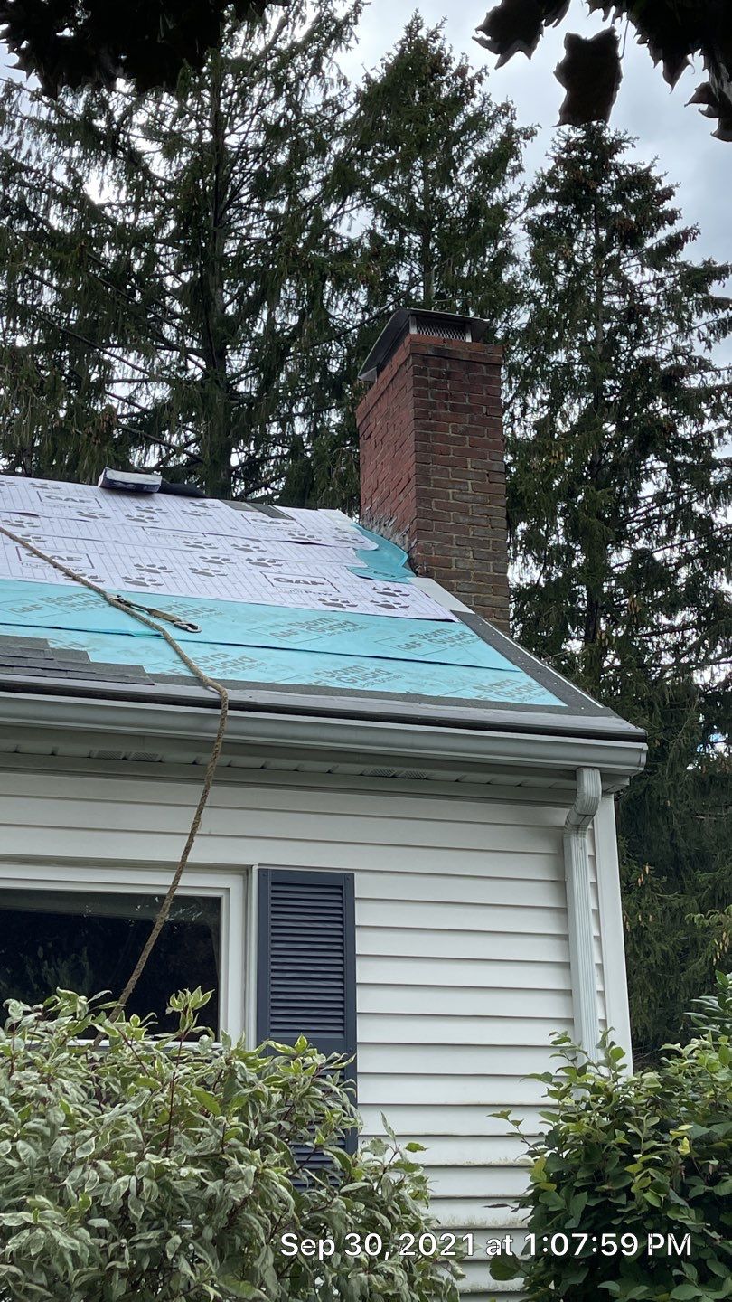New Skylights and Roof in Belmont, MA by Master Roof Inc