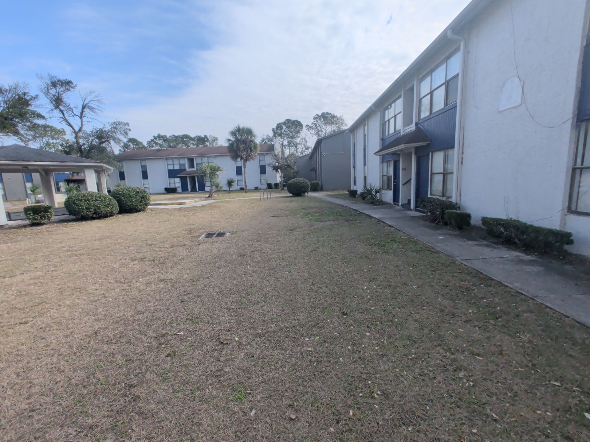 Commercial Landscape Cleanup & Weekly Maintenance — Grassy Pond Apartments by Harmoni Home Services