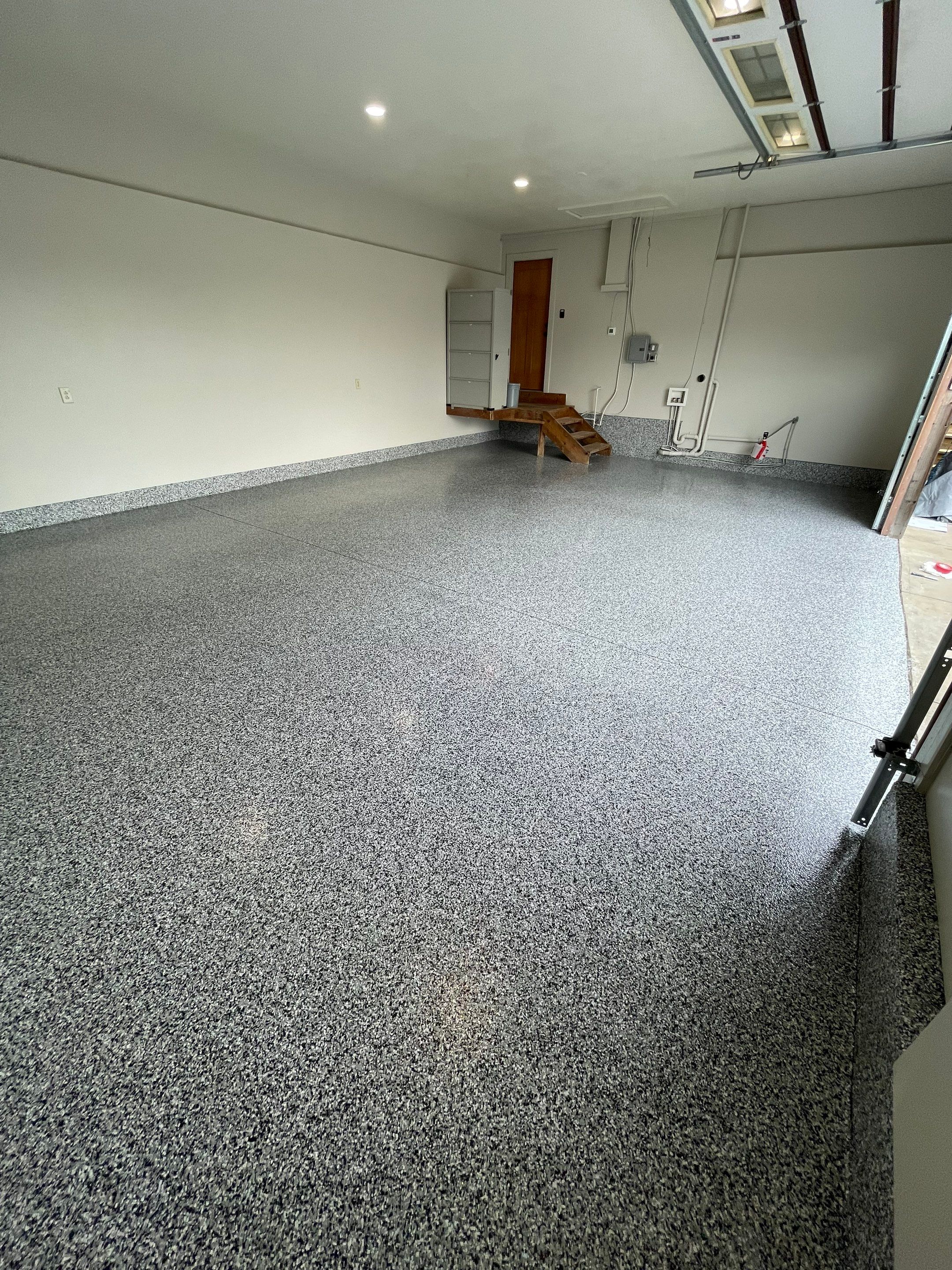 Domino Flake Floor Coating and Crack Repair in Chancellor by Select Painting, Coatings & Garage Cabinets