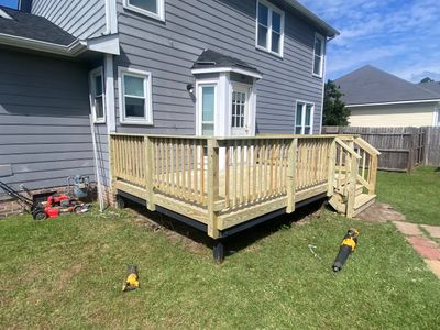 Pressure-Treated Wood Deck Resurface and Trim Repair in Fayetteville