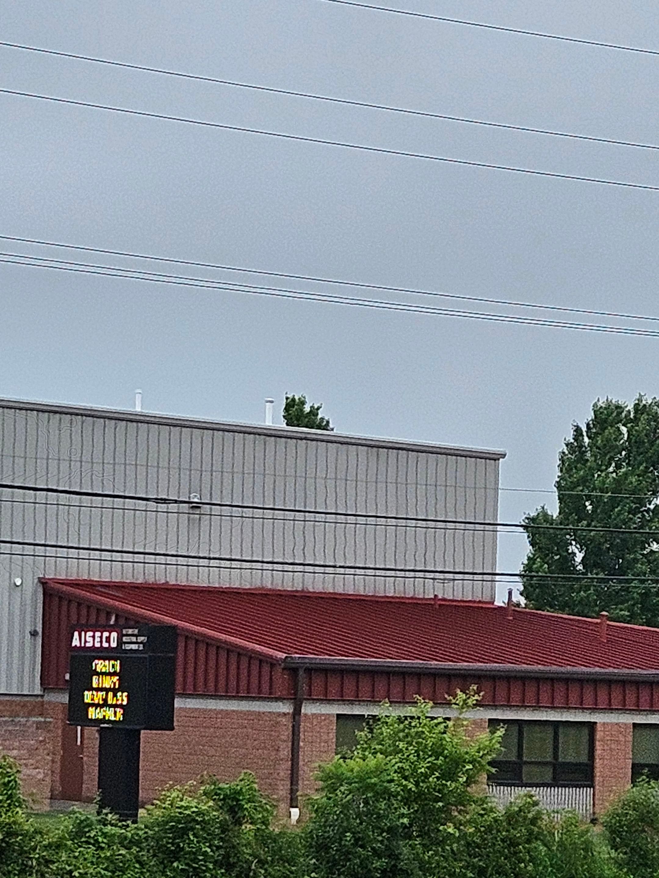 Metal Roof Restoration Project in Wadsworth by Miller's Commercial Roofing LLC