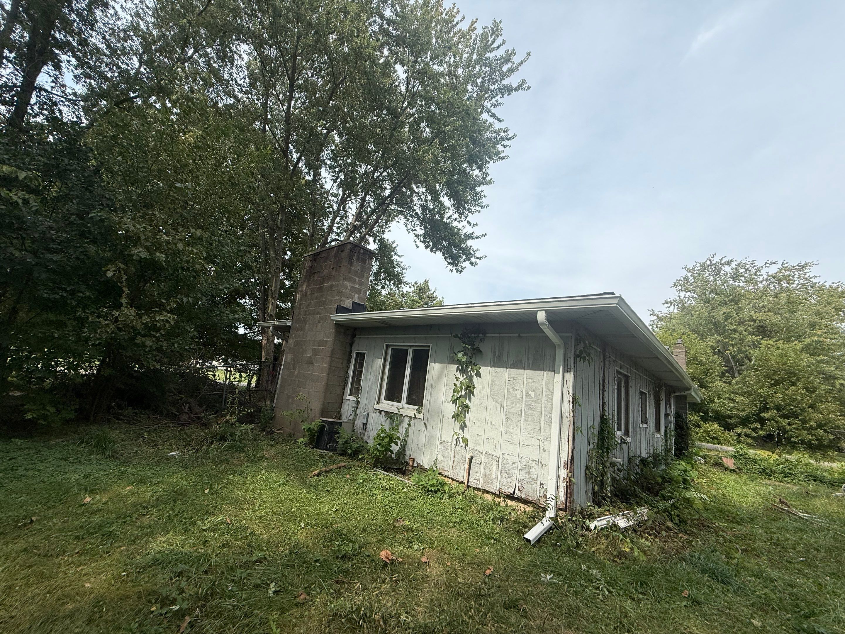 Owens Corning Duration - Chateau Green / 6-Inch Gutters - White by Hoel Roofing & Remodeling