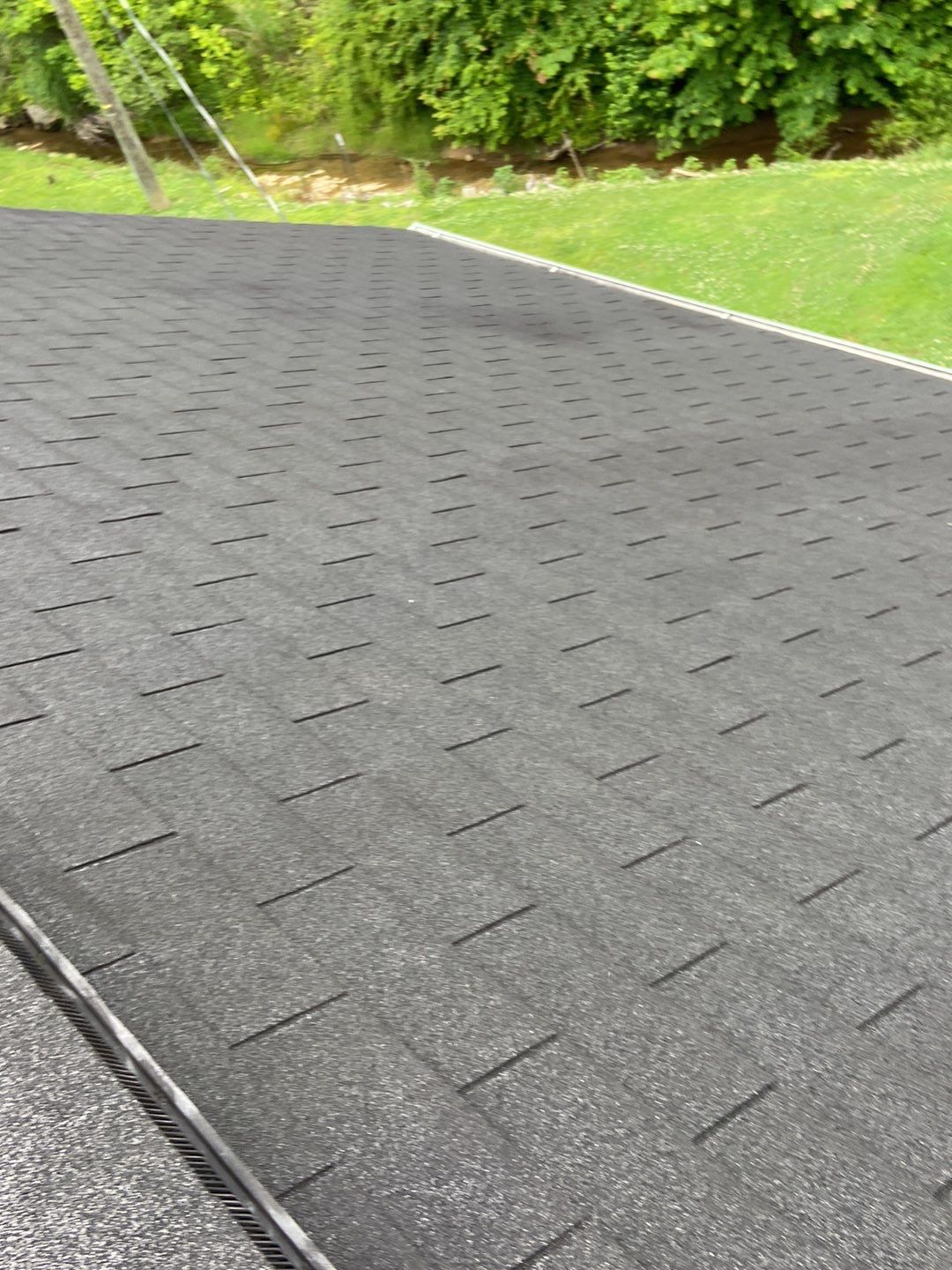 Residential Roofing Installation using Performance Shingles by Mr. Roofer