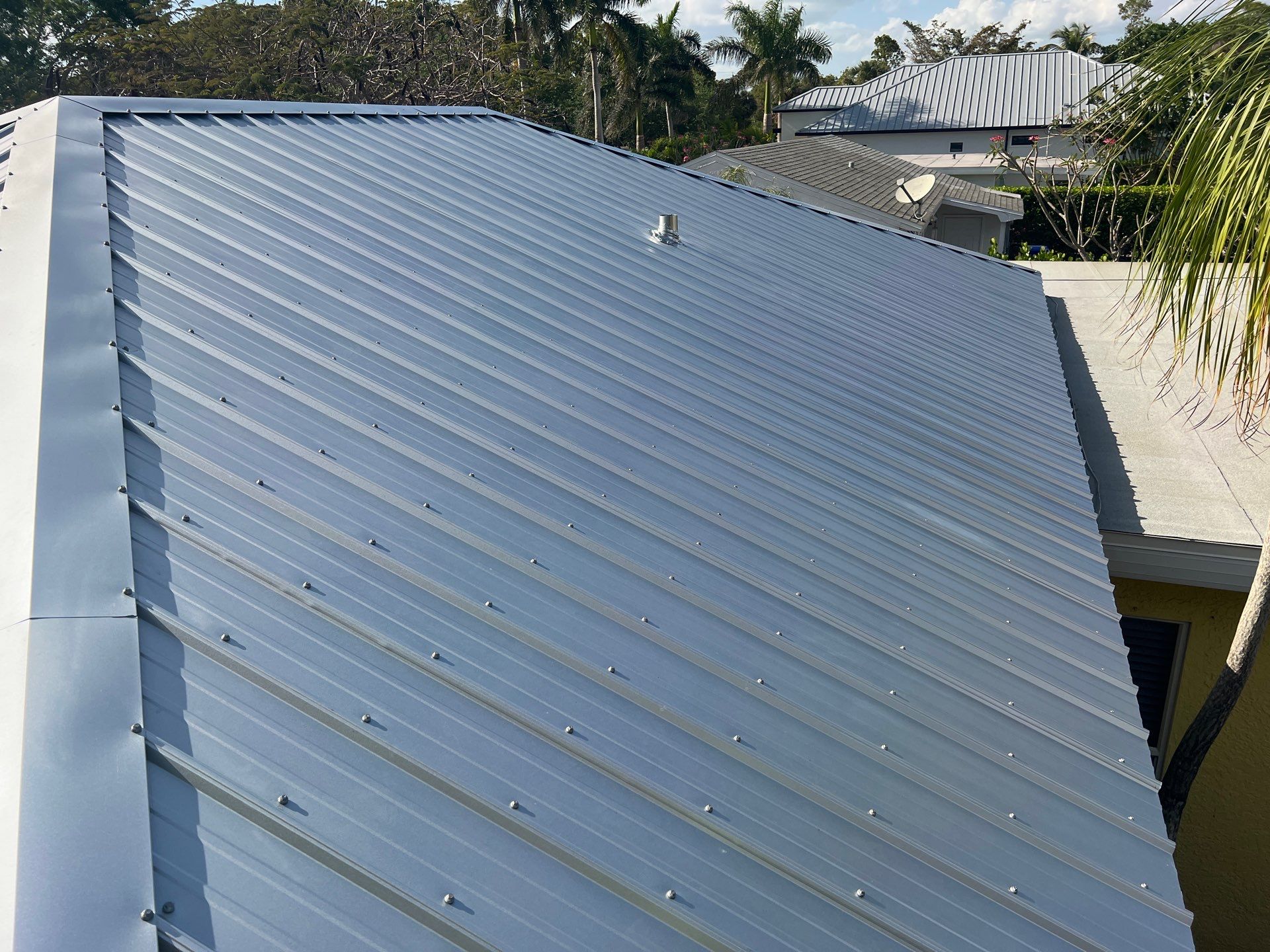 Residential Roofing Installation using Durabull Classic Rib Panel by Durabilis Roofing INC