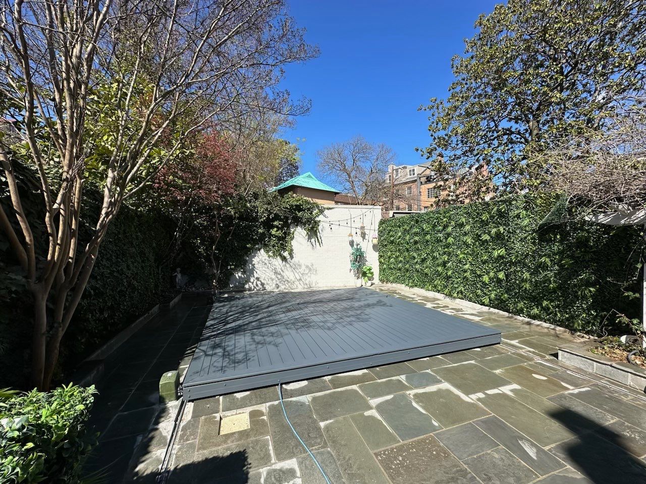 Automatic deking pool cover  by Jesus Master Handyman LLC 