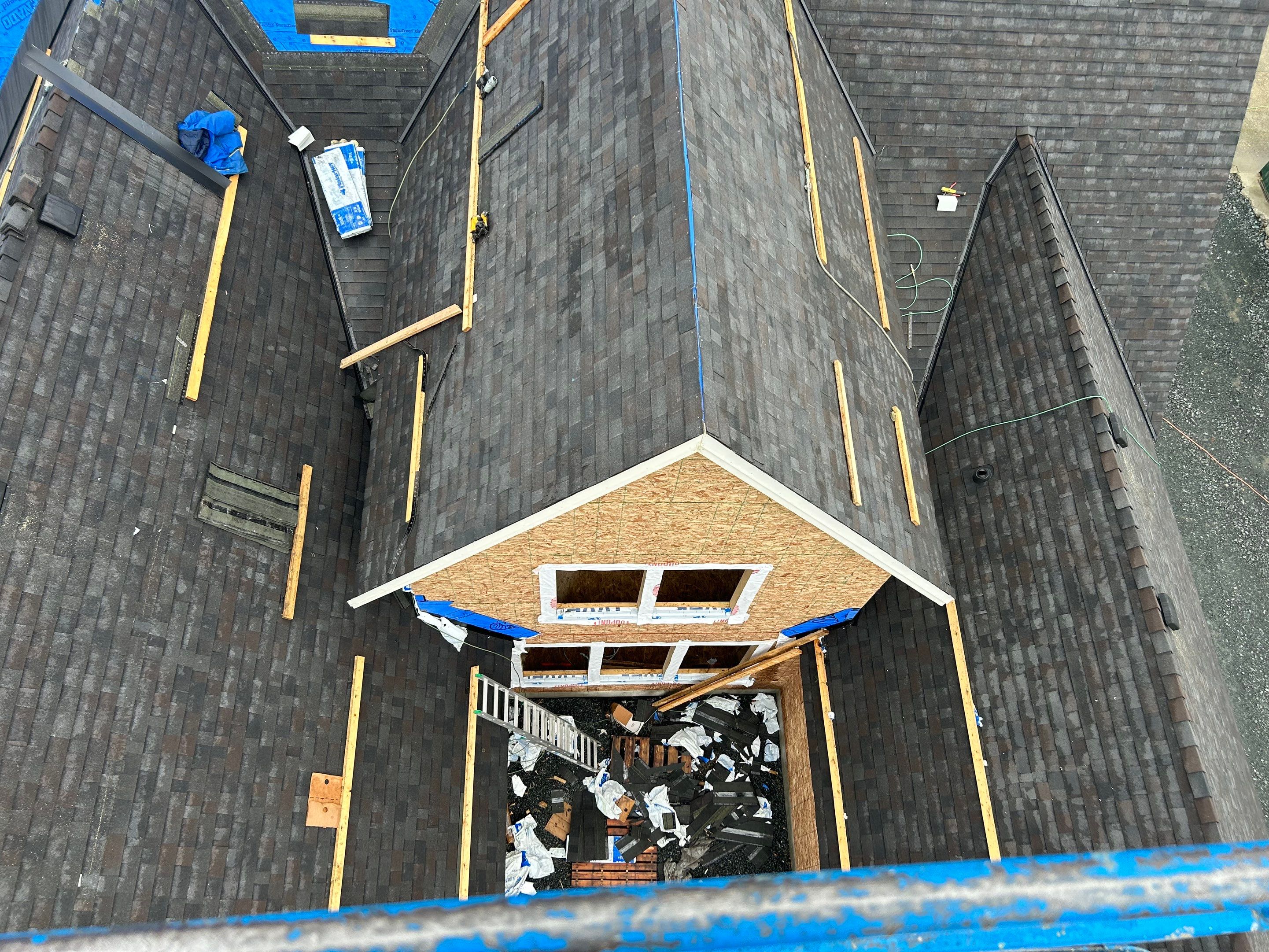 Residential Roofing Installation using Malarky Vista Shingles and Prolok Metal  by Top Notch Roofing Inc
