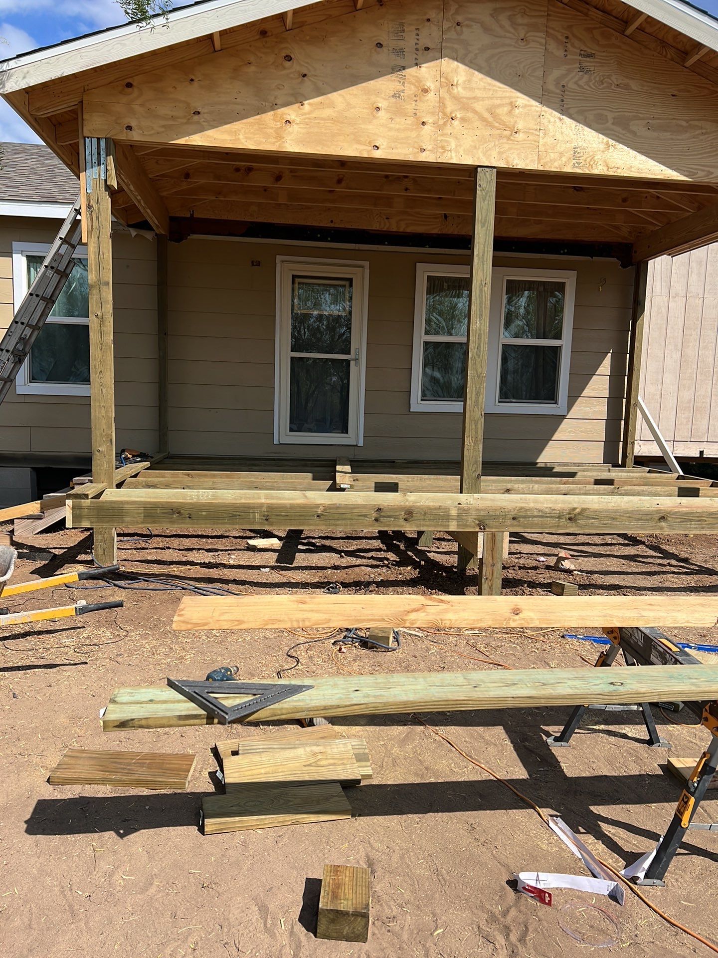 Front Porch Sitt'n by Bayfront Roofing and Construction