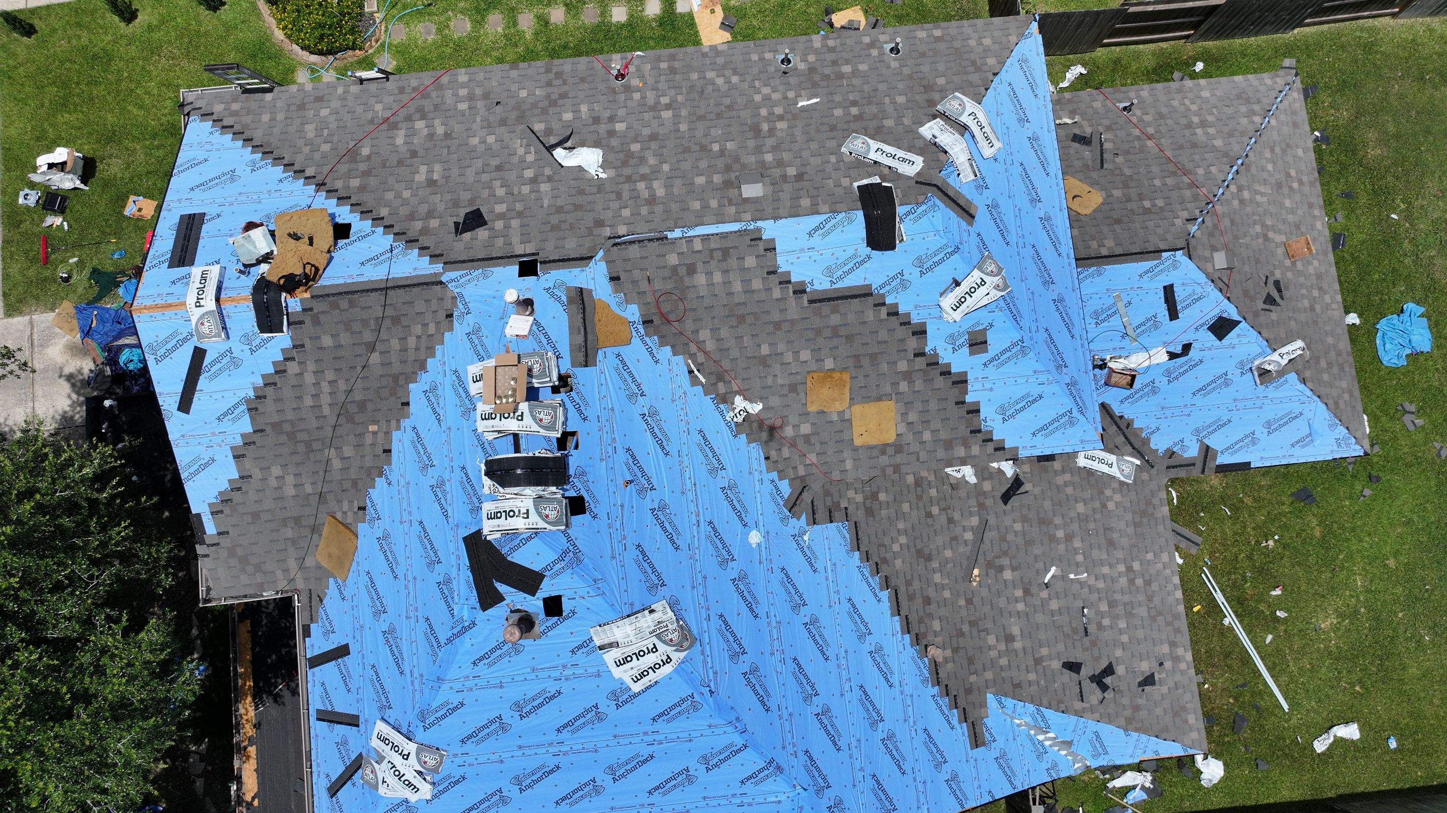 Storm-Damaged Roof Replaced — Houston, TX by PL Roofing & SB Roofing, LLC.