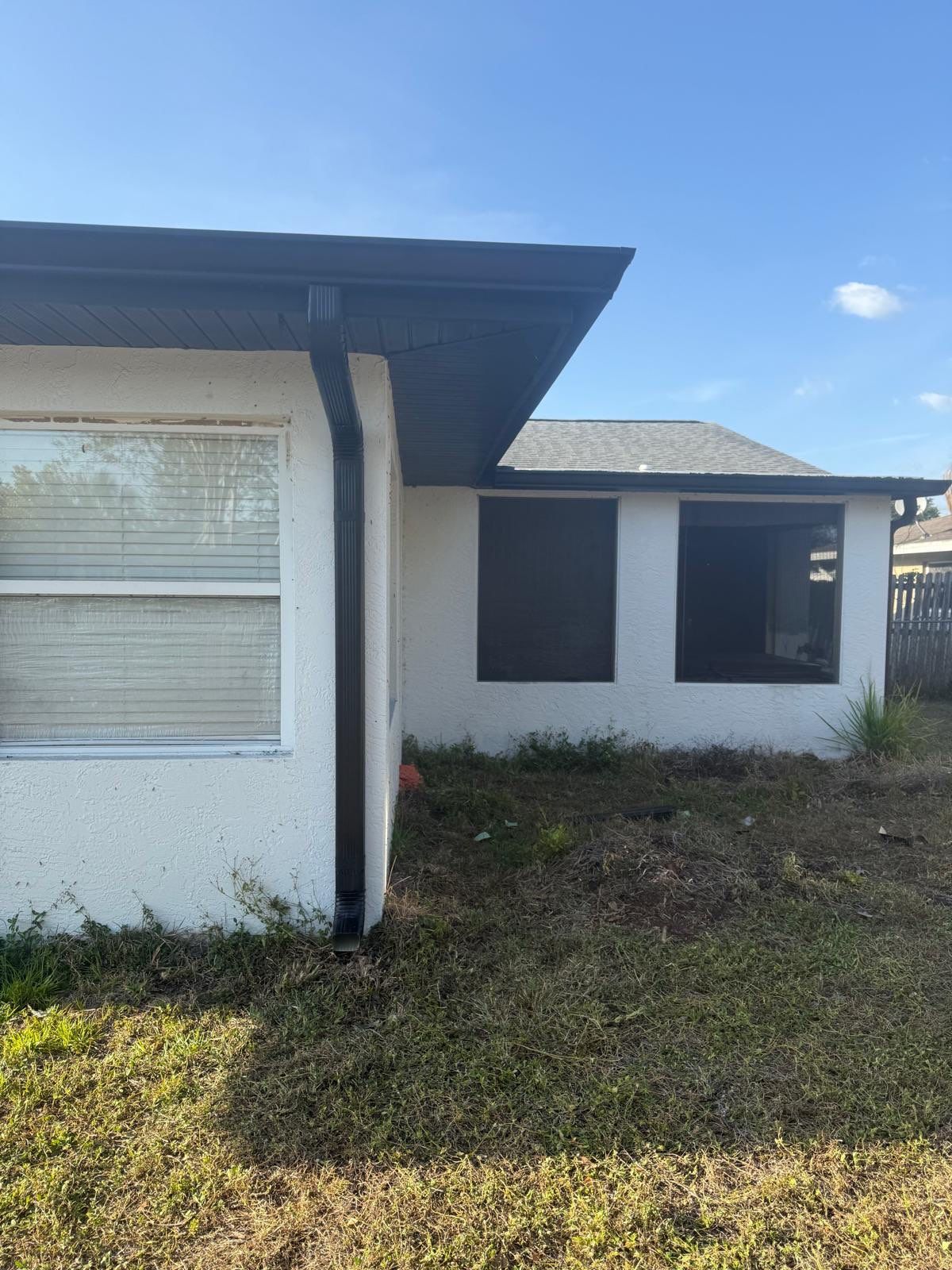 New Downspouts and Splash Guards in Sarasota FL by Gutter Professors