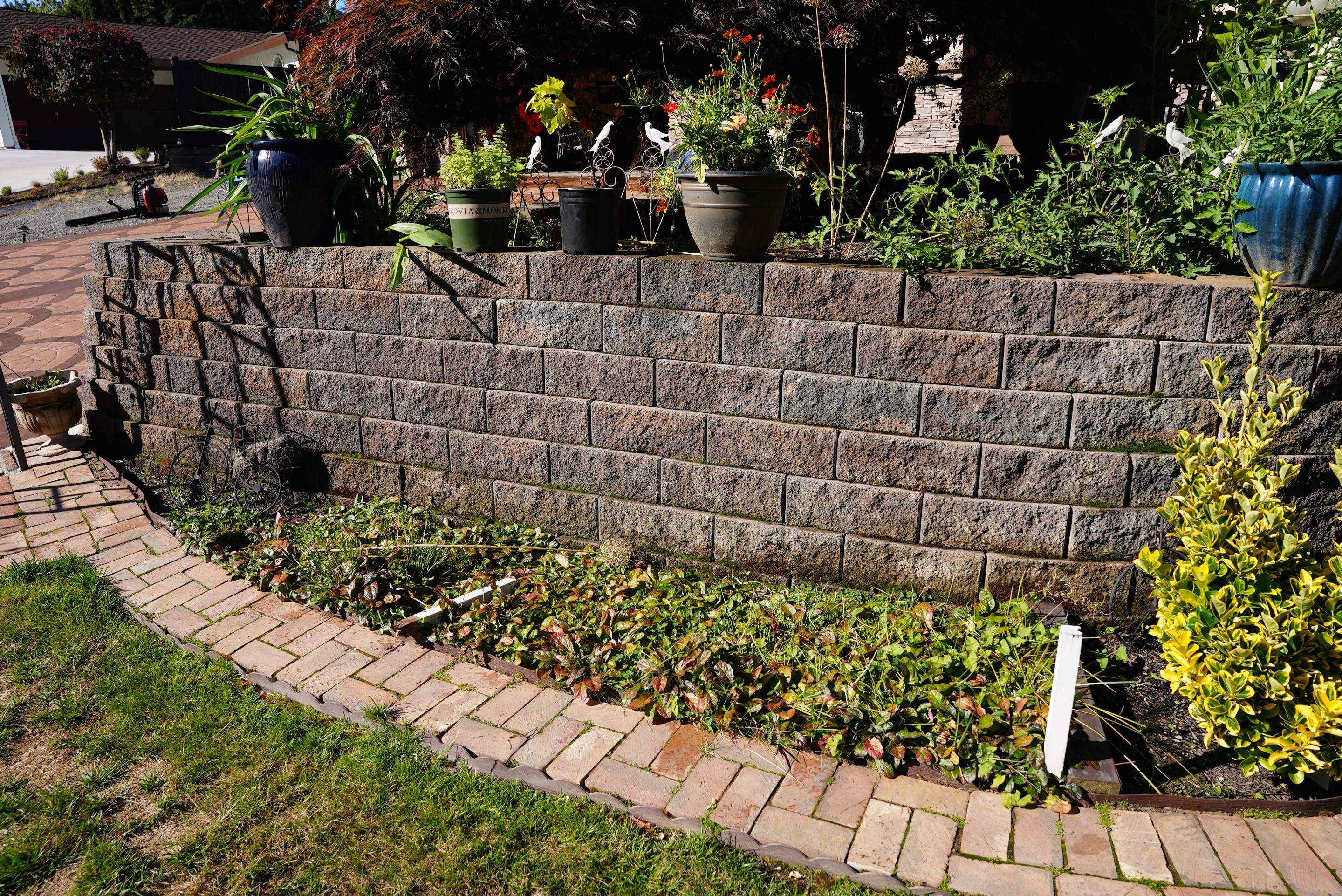 Mehta | Tiled Driveway with Sealer & Retaining Wall  by Jireh Asphalt & Concrete Inc 