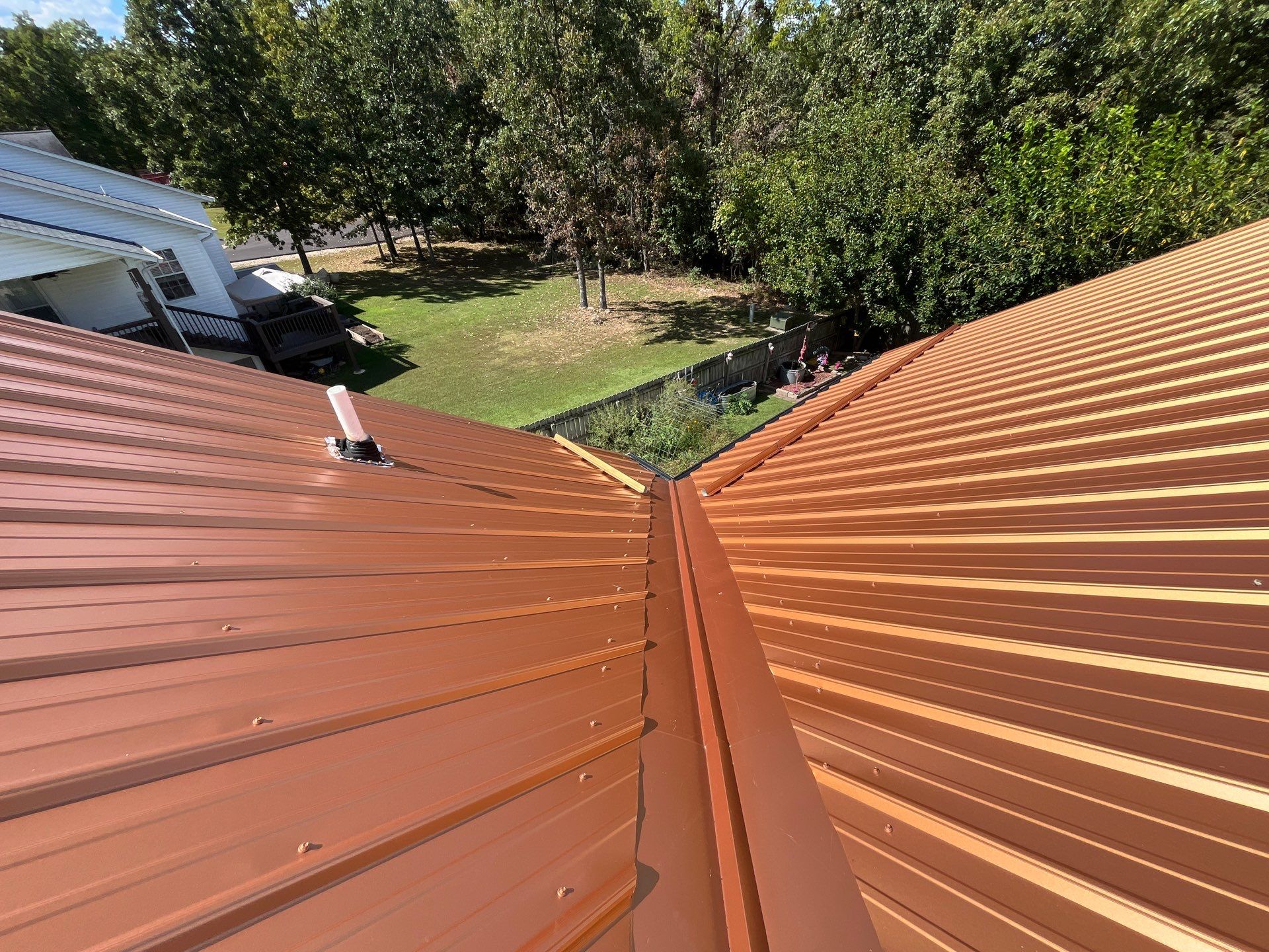 Residential Roofing Install - Copper 29 Guage G-Rib Metal & 6" Inch Seamless Gutters + 3"x4" Aluminum Downspouts  by Titan Commercial & Residential Roofing 