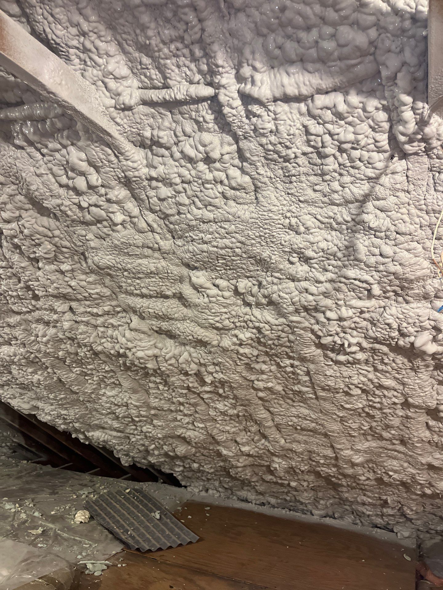 Attic Retrofit using open cell spray foam by NYS Foam & Energy