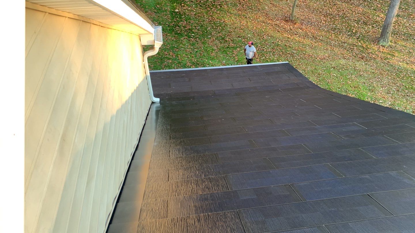 Tesla Solar Roof Replacement by American Home Contractors