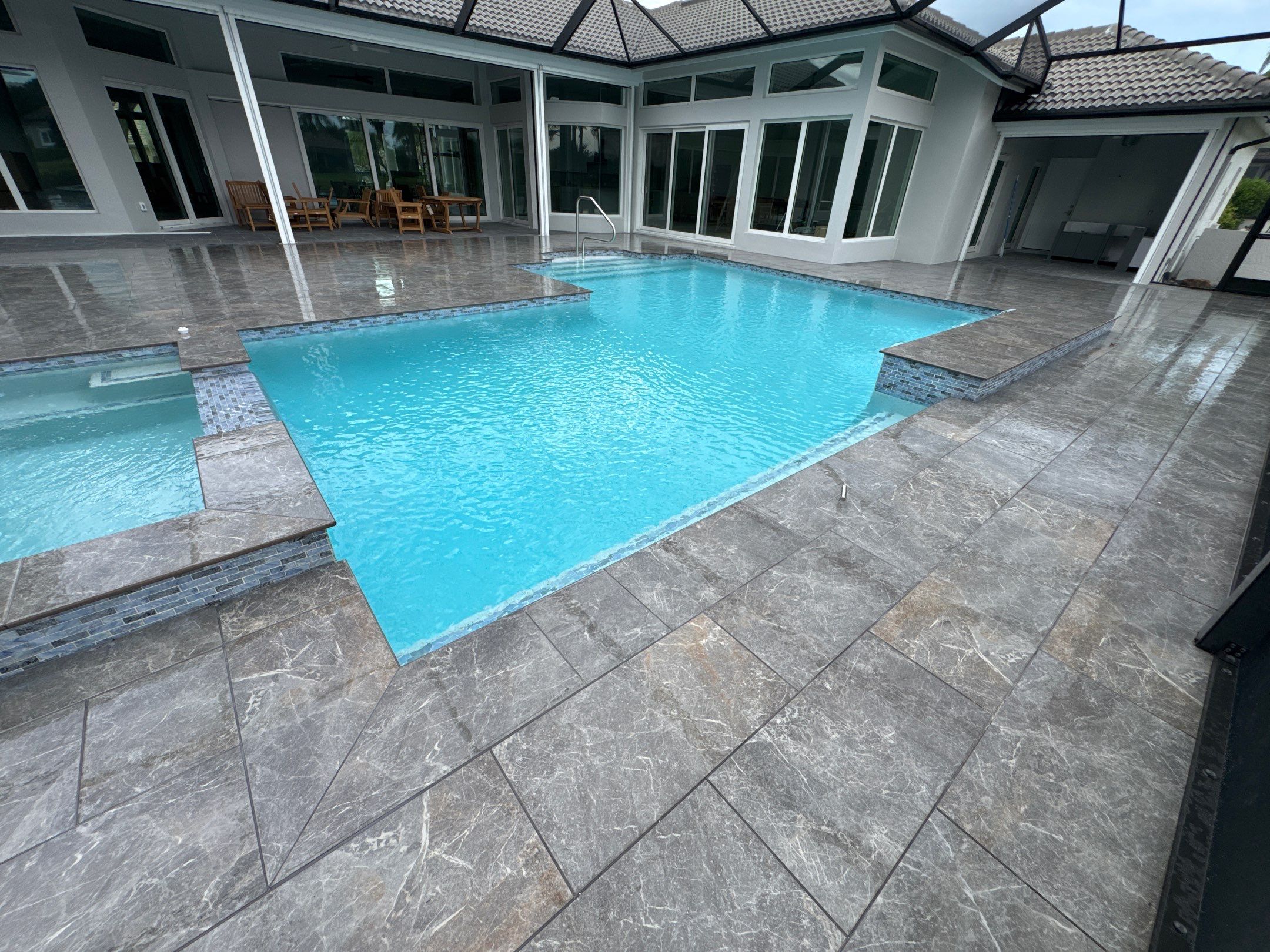 Pool Renovation/Porcelain pavers/Wild Cat Run by Old Town Pavers Llc