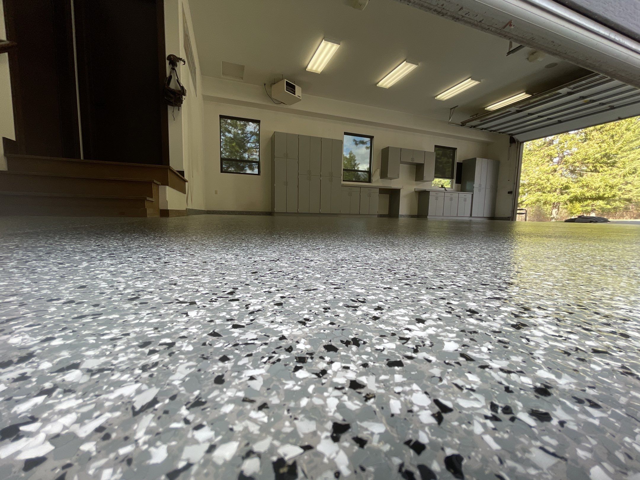 Garage Transformation using Smoke and the Penntek Evolution System by Croc Coatings, LLC