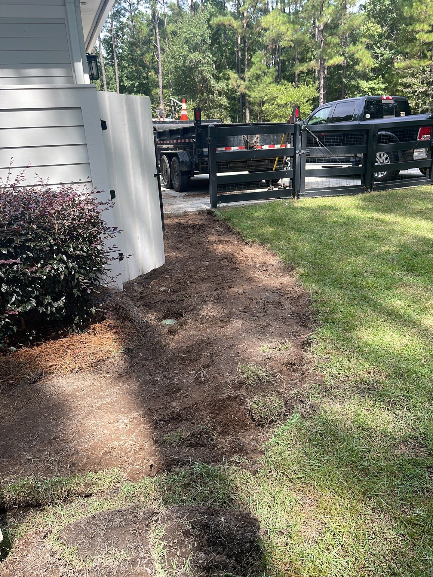 Curved Gray Paver Walkway Installation in Bluffton by Lowcountry Scapes, LLC