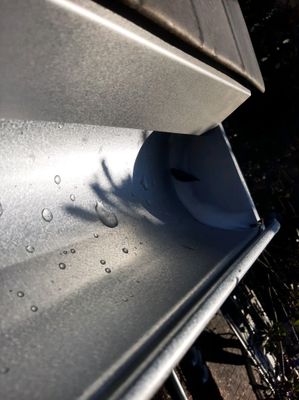 Gutter Installation using Galvalume Half Round Seamless Gutters