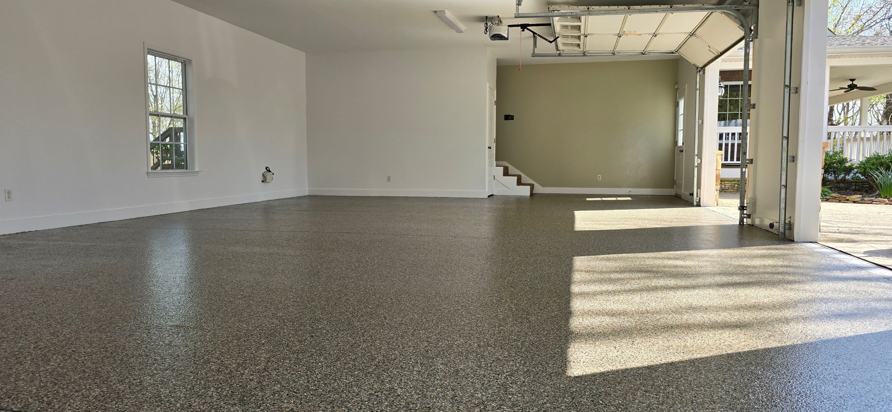 Garage Upgrade Using Custom Creekbed Blend by Elite Floor Solutions