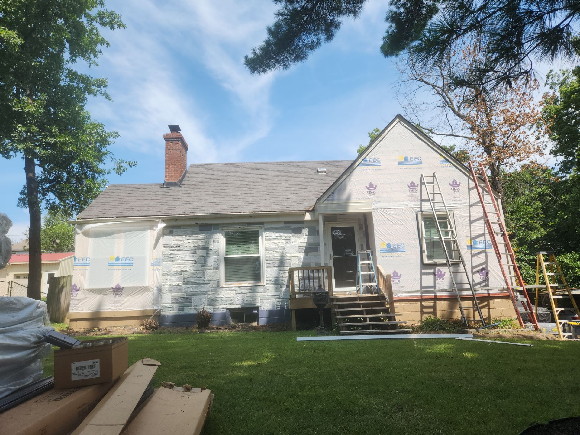 Kansas City Indigo Insulated Craneboard Siding and Window Replacement Project in Kansas City by EEC Windows, Siding & Roofing