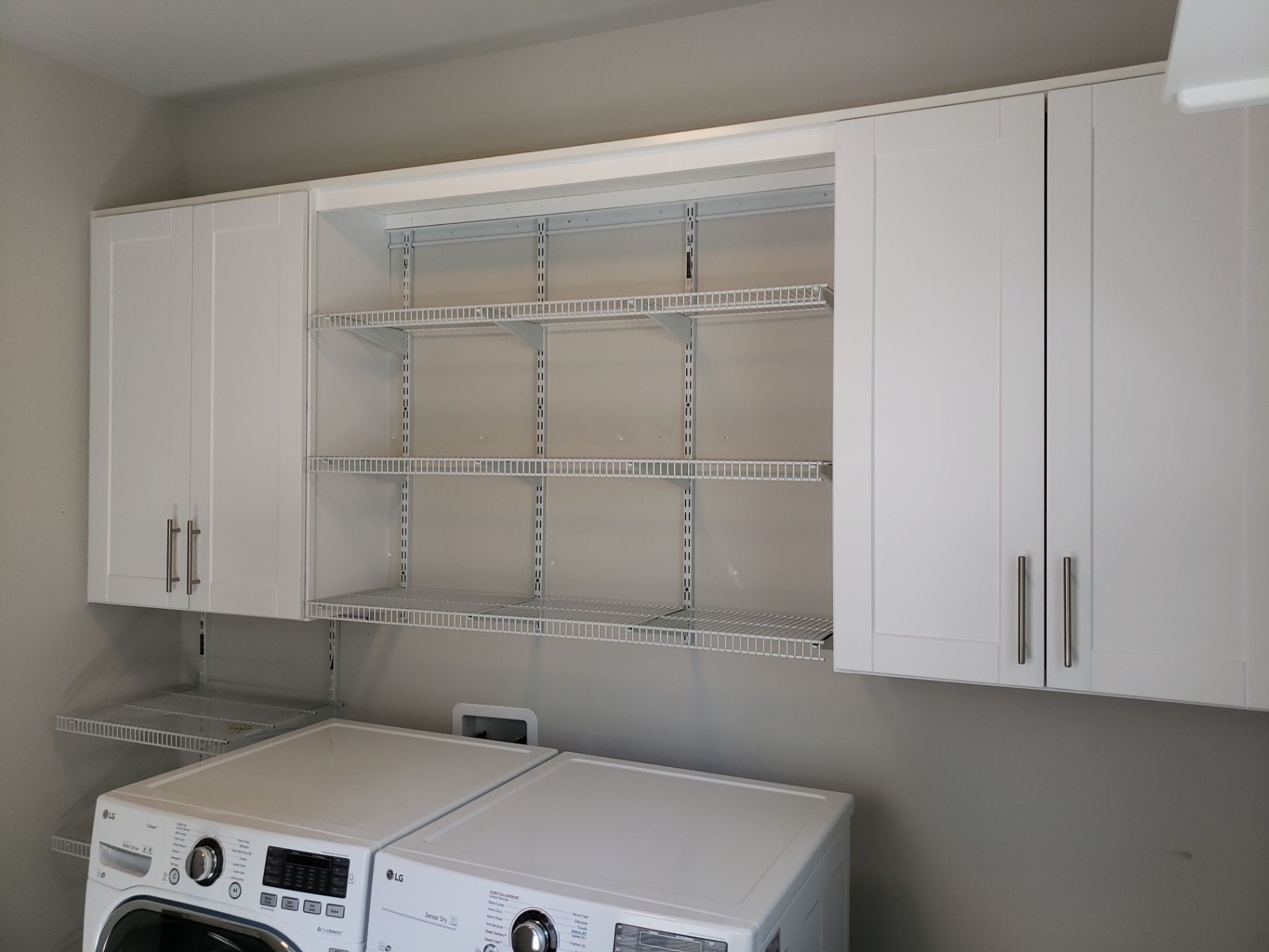 Laundry Room Storage Transformed! by A Step Above Handy LLC
