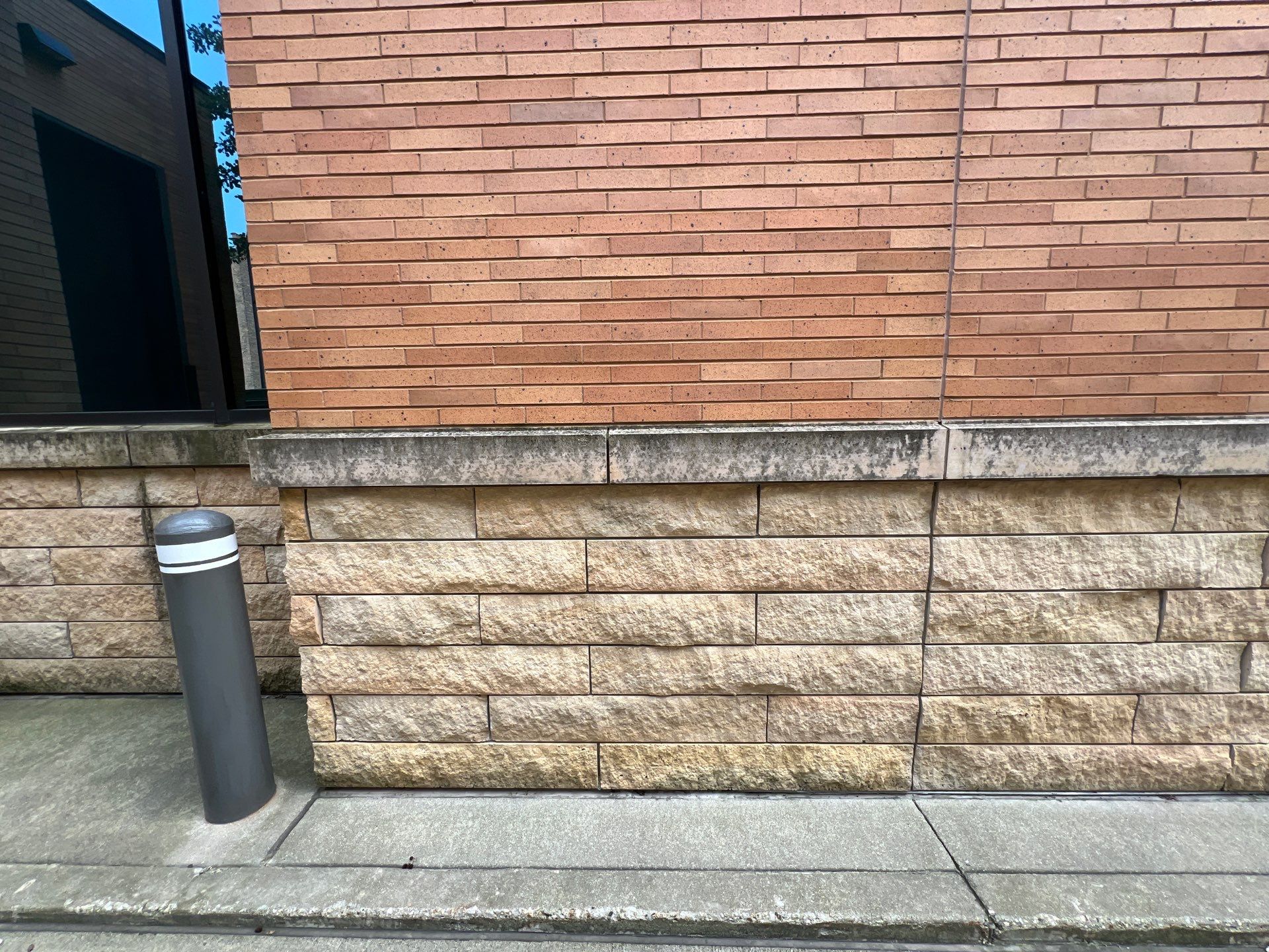 natural stone using Algaecide, soft wash soap by Northern Power Washing LLC.
