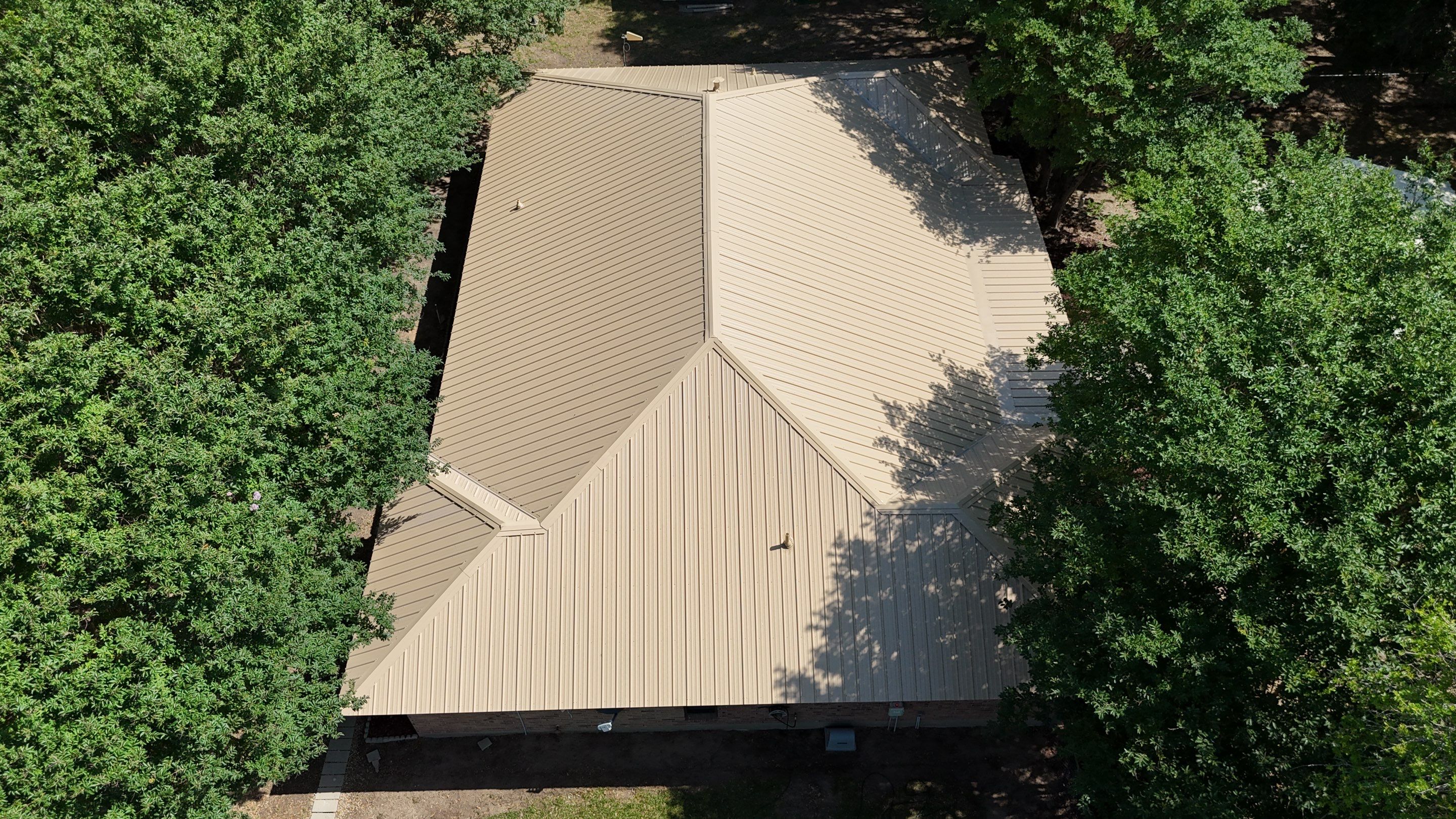 Thornton, Tx - Metal Roof 26G Alamo Rib, Saddle Tan color by Wells Legacy Roofing