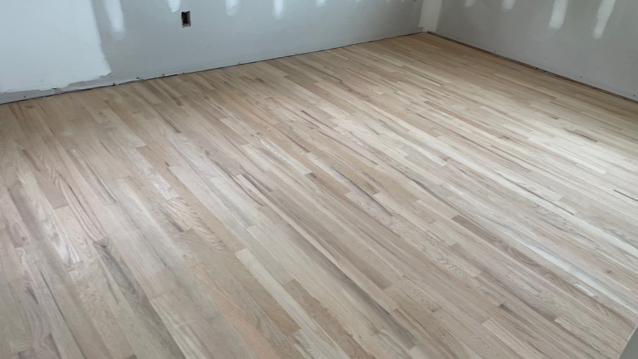 Remodeled Home with new tile floors, Showers and Refinished Oak Floors with stain and Waterbased Finish by Footprints Floors of Coastal Carolina