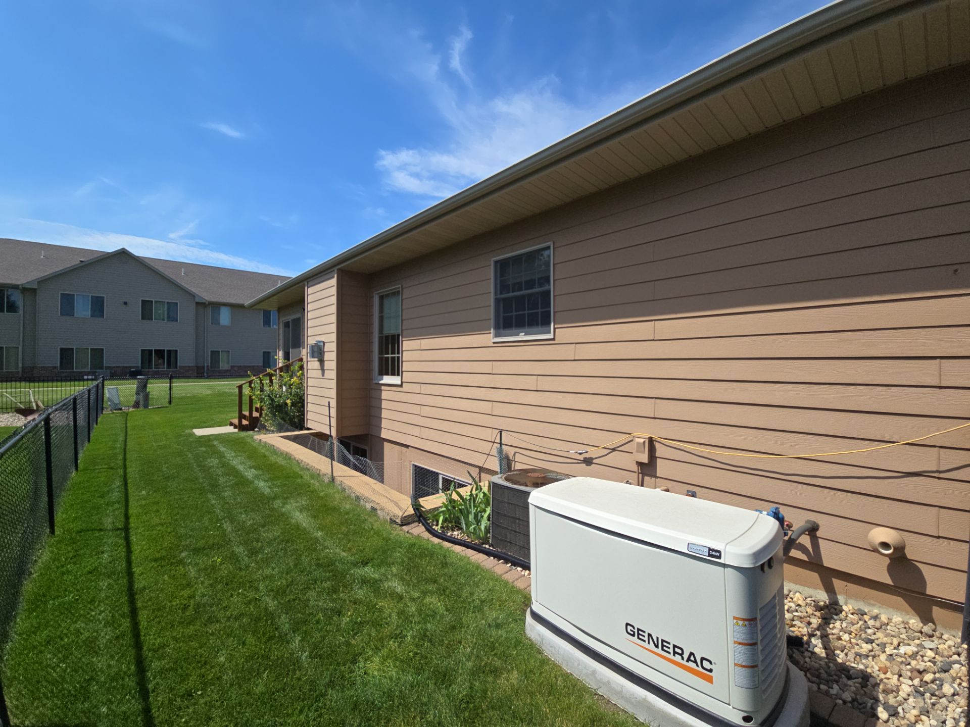 Sioux Falls Residential Exterior Door and Siding Refresh by Select Painting, Coatings & Garage Cabinets