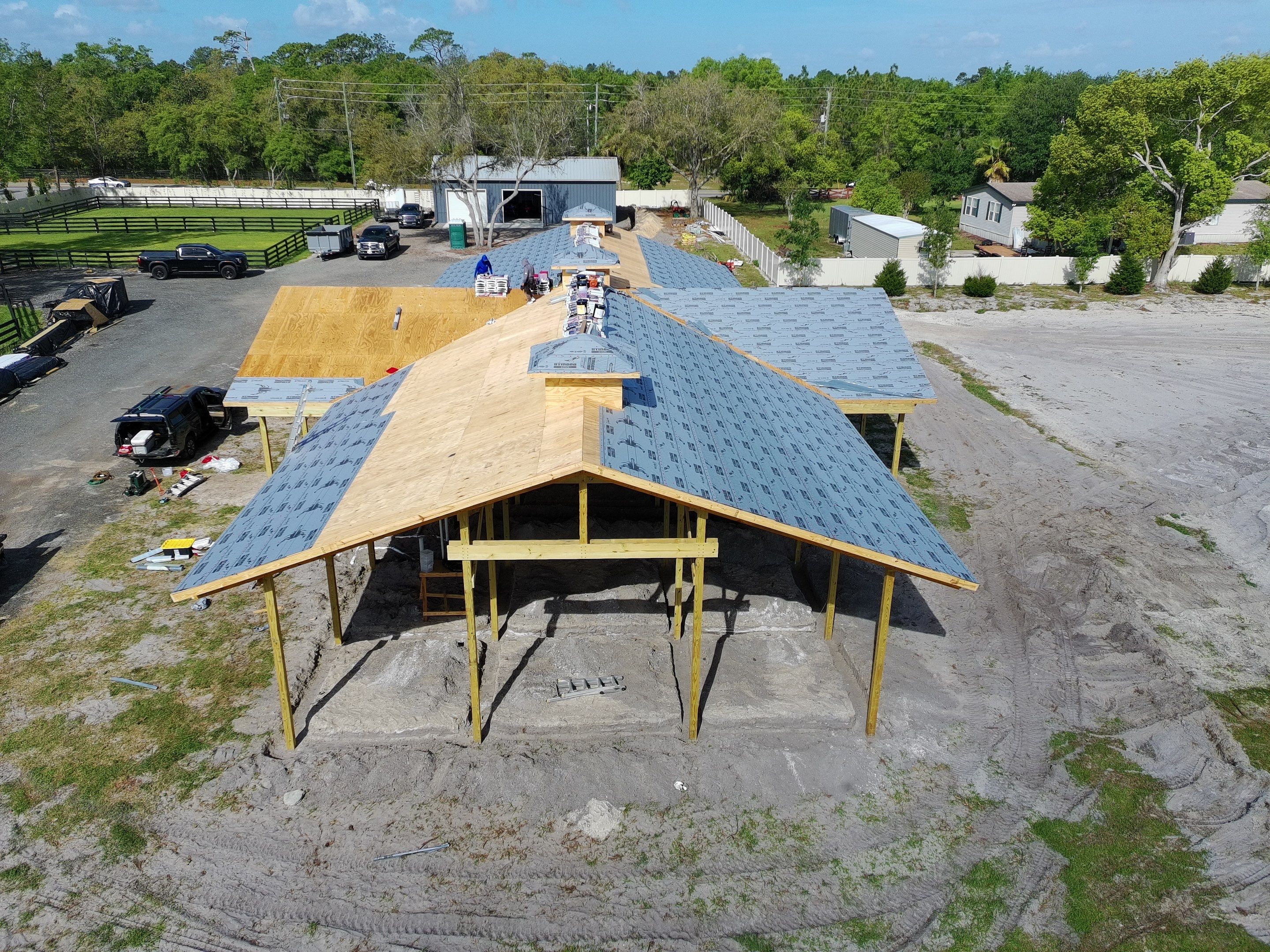 Custom Post-Frame Horse Barn and Shingle Roof Installation in Geneva by Fortified Roofing Solutions Corp.