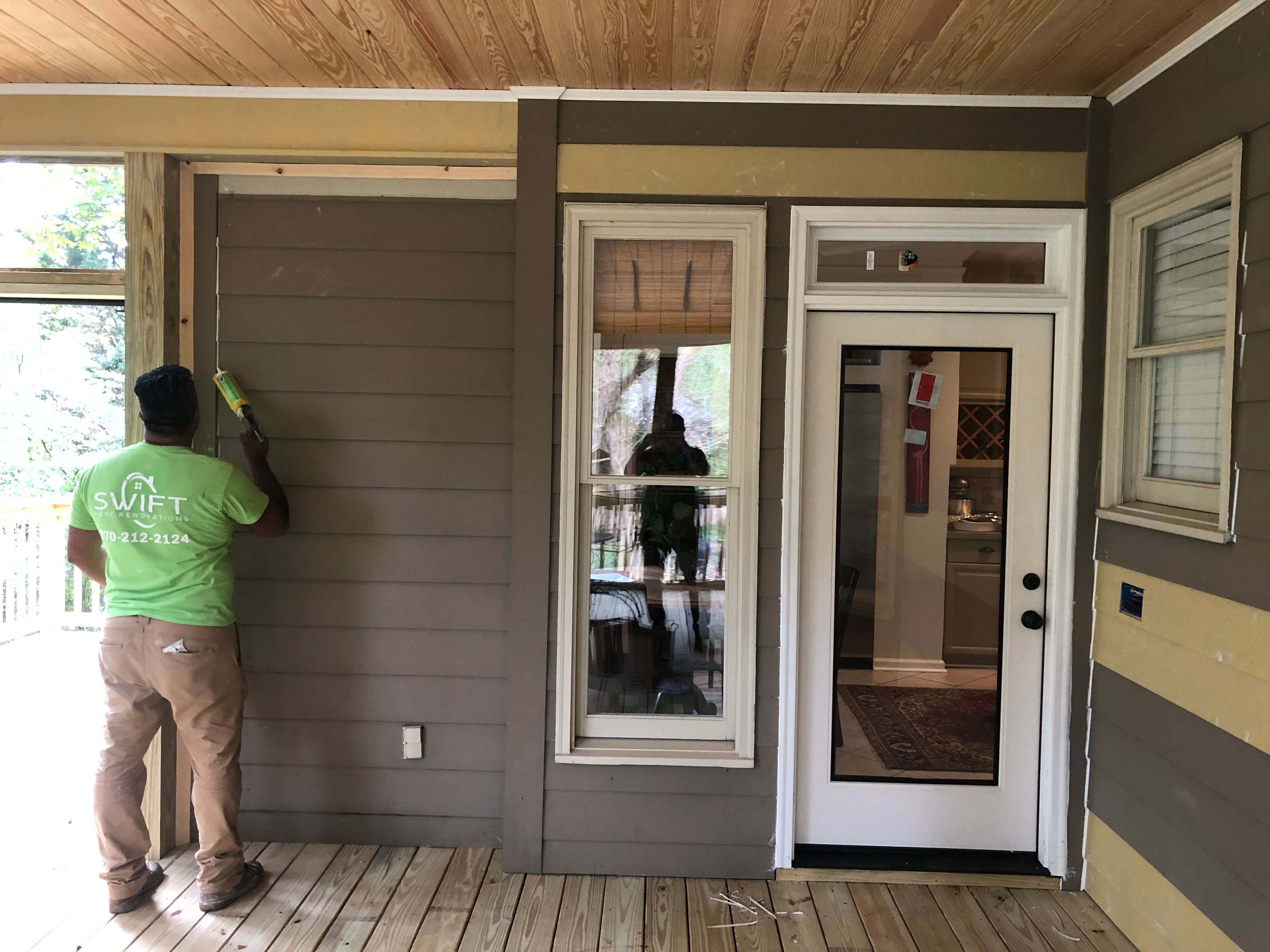 Elevated Screened-In Porch and Custom Wood Deck in Decatur by Swift Home Renovations 
