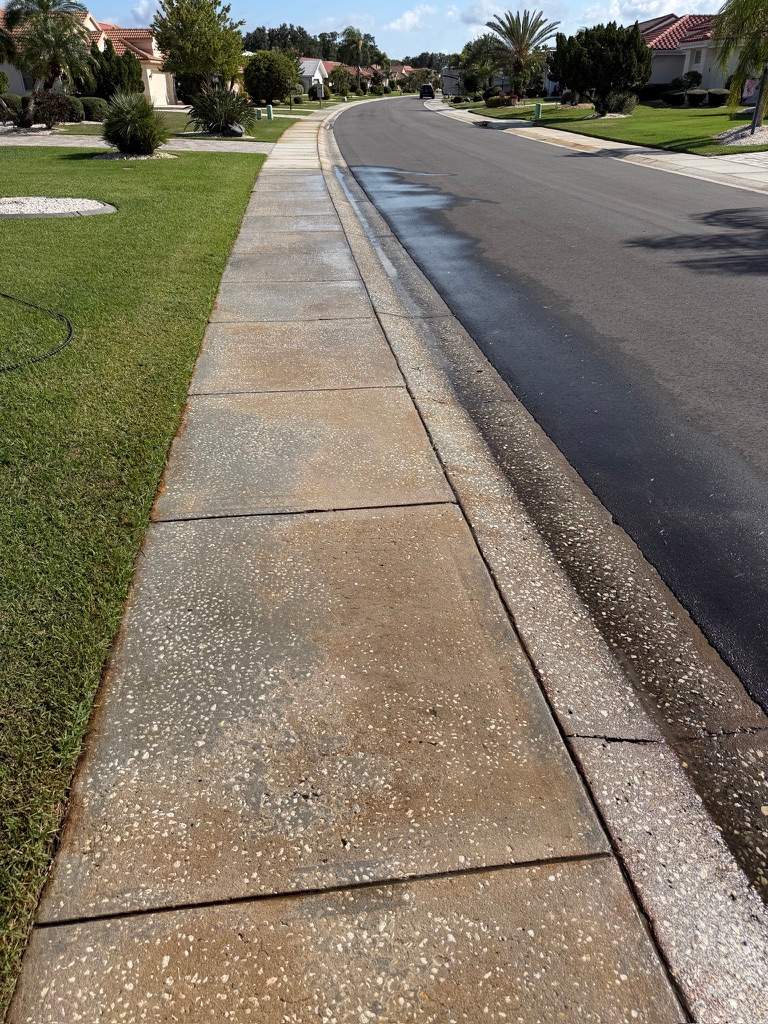 Professional Rust Removal for Concrete Sidewalk in Sun City Center by Supreme Paver Experts