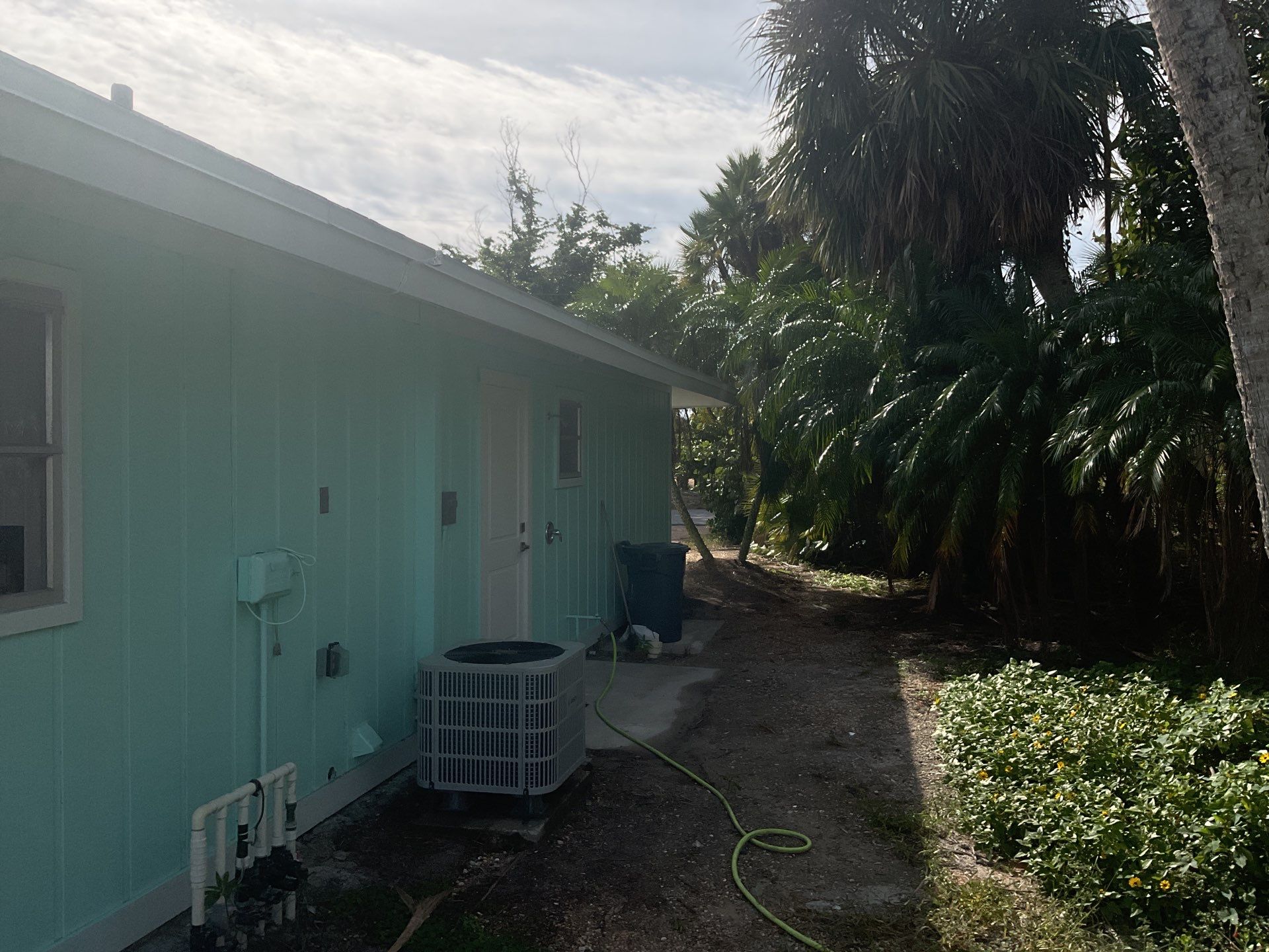 White Seamless Gutters Installation in Sanibel FL by Gutter Professors