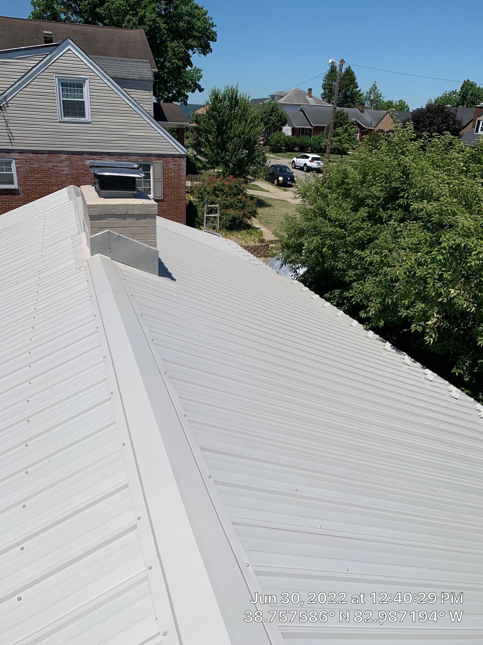 Metal Roofing, Skylights, Porch Build by Secure Construction Company Inc