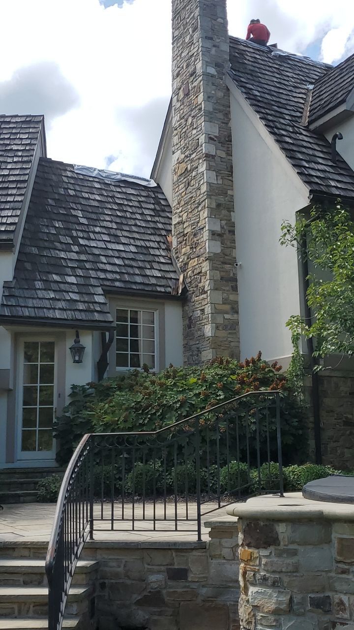NEW CertainTeed Grand Manor from old Cedar Shake! by Absolute Roofing and Construction