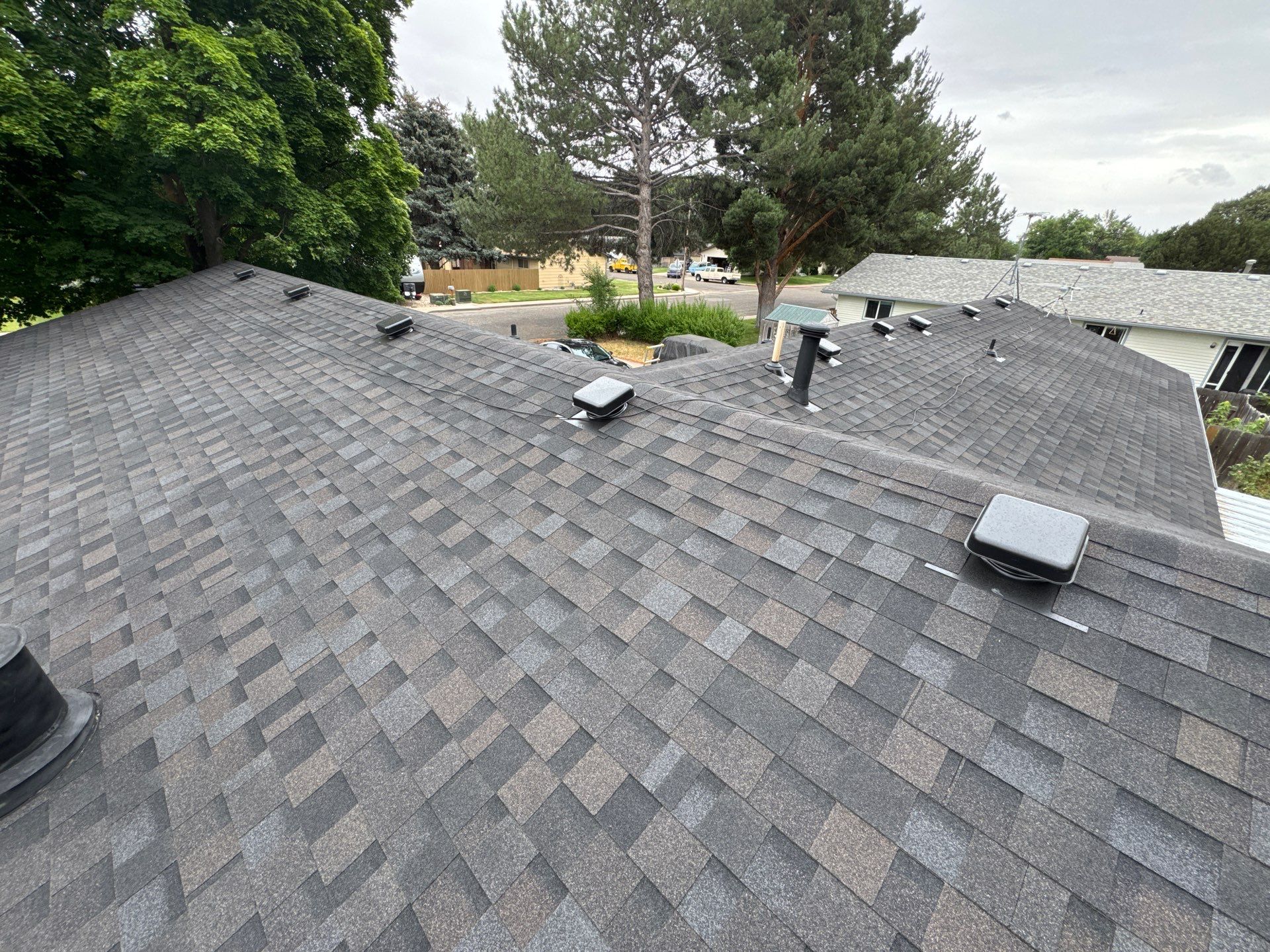 Residential Roof Replacement With Dark Gray Architectural Shingles in Mountain Home by Olive Roofing