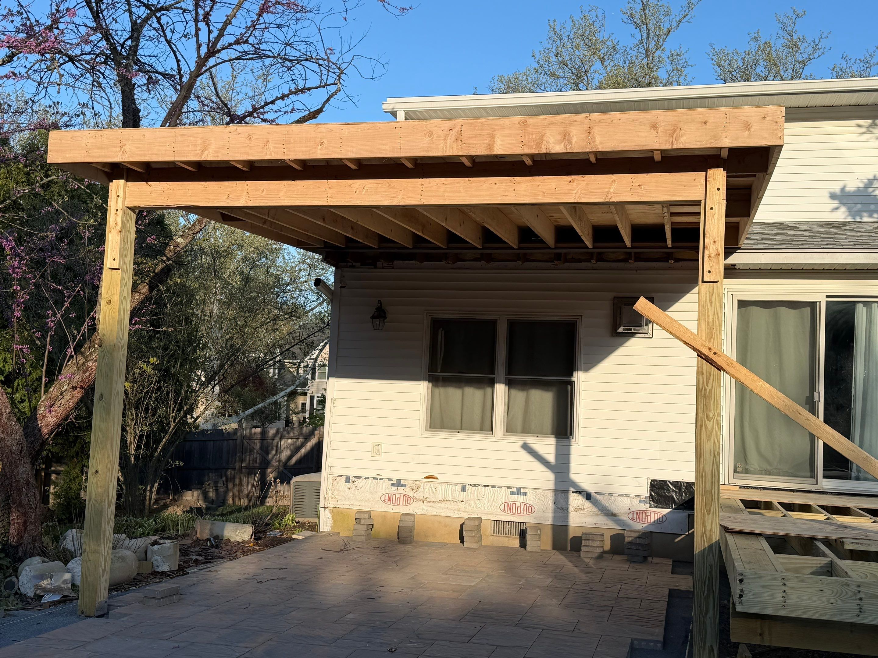 Deck Resurface with an add on roof in Princenton by deck guardian