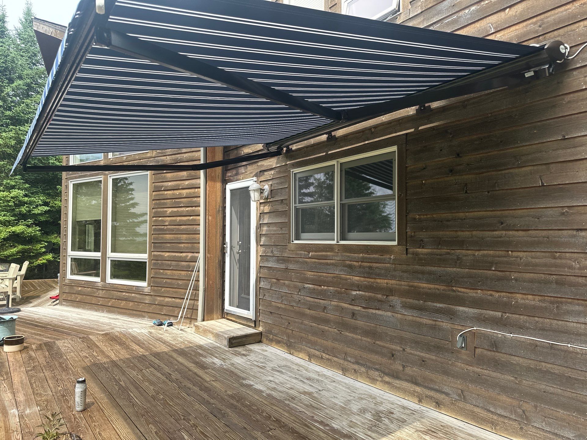 Sunesta Retractable Awning and Privacy Shade Installation in Ellsworth by Rainbow Seamless Systems