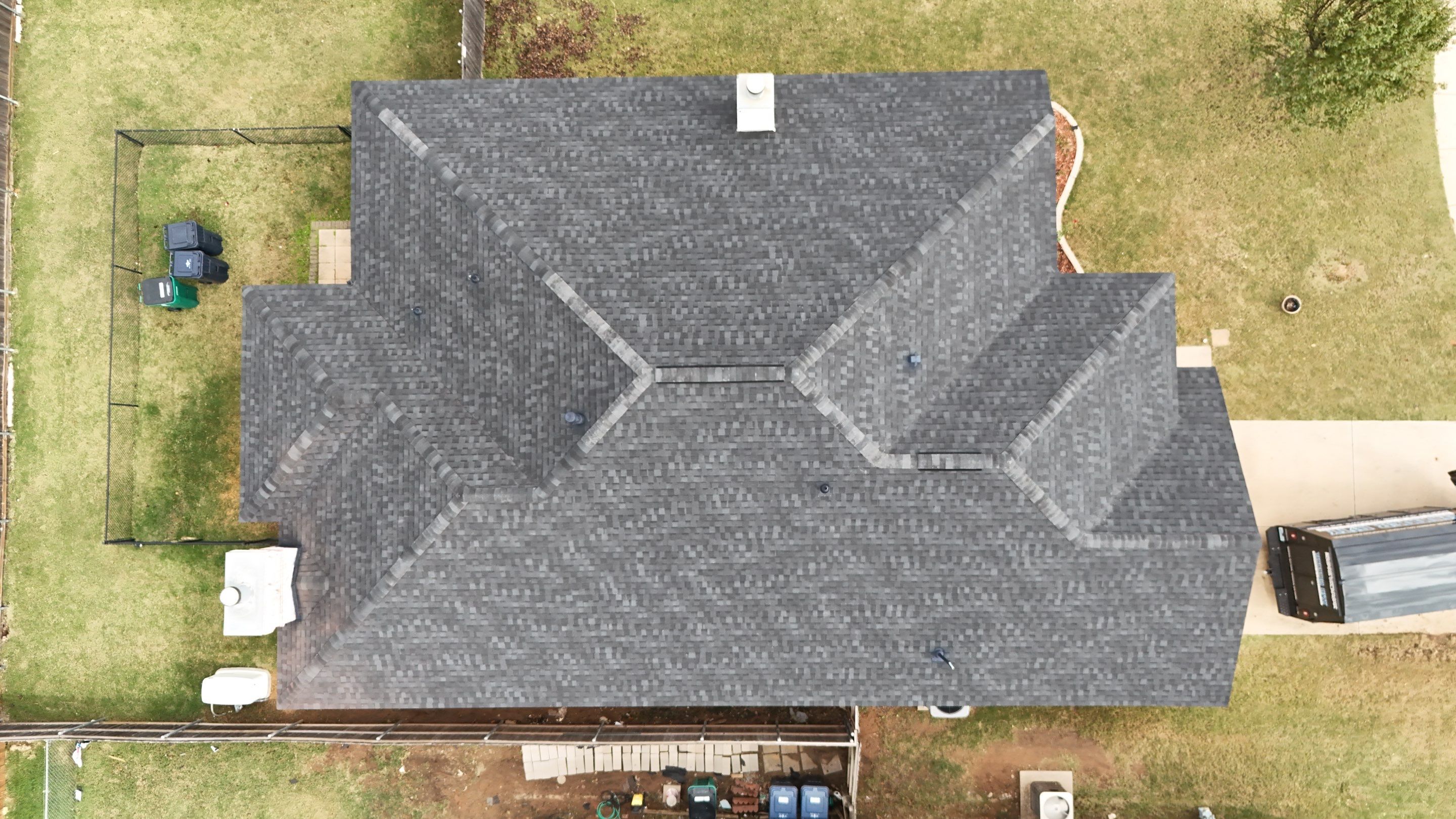 Residential Roofing Installation using titan xt rustic black by Thunder City Roofing